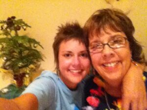 My tiny Norfolk Pine (and mom my and me) in 2011 when I first bought it